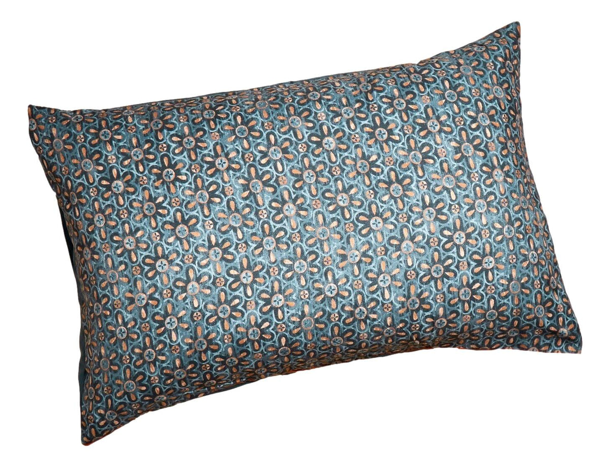 Dark teal pillowcase featuring a dense lattice floral watercolor pattern