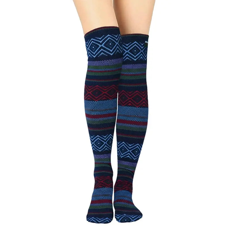 Over-the-knee fleece socks with blue Nordic pattern and red green stripe bands