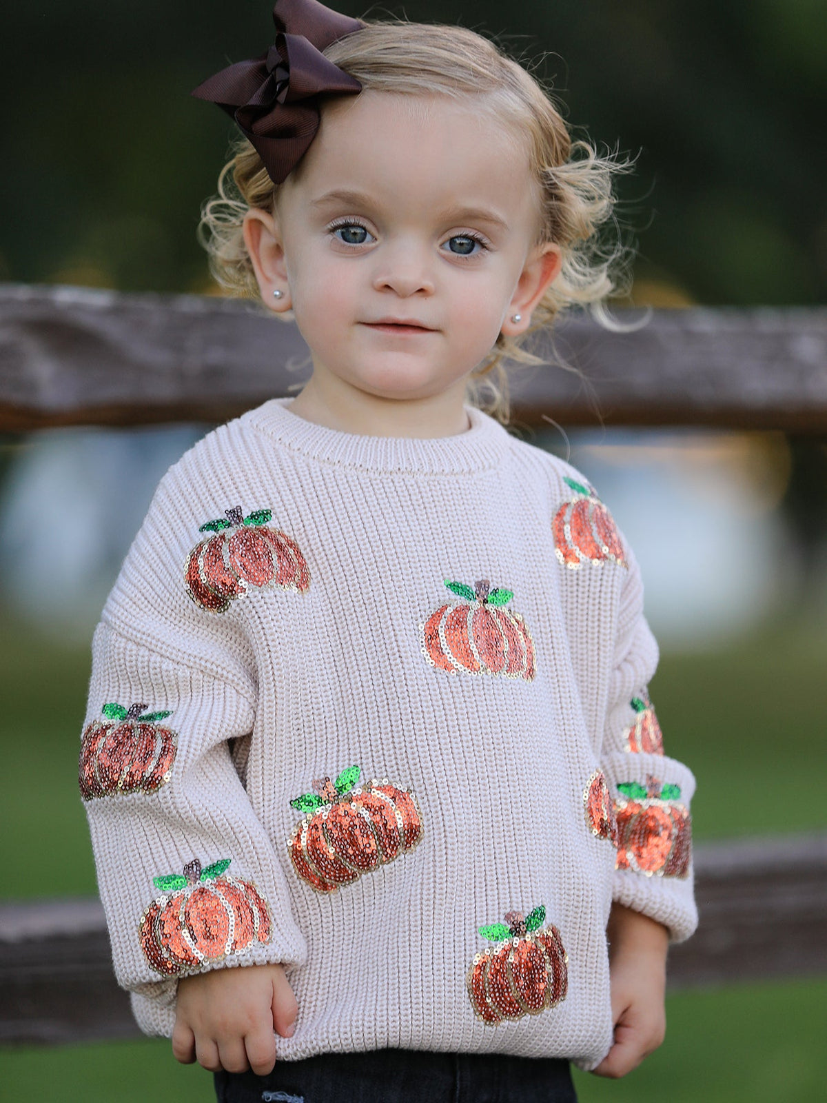 Kids beige knit sweater with sequined pumpkin appliques and crew neckline