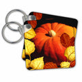 Large pumpkin key chain with autumn leaves design and two metal key rings