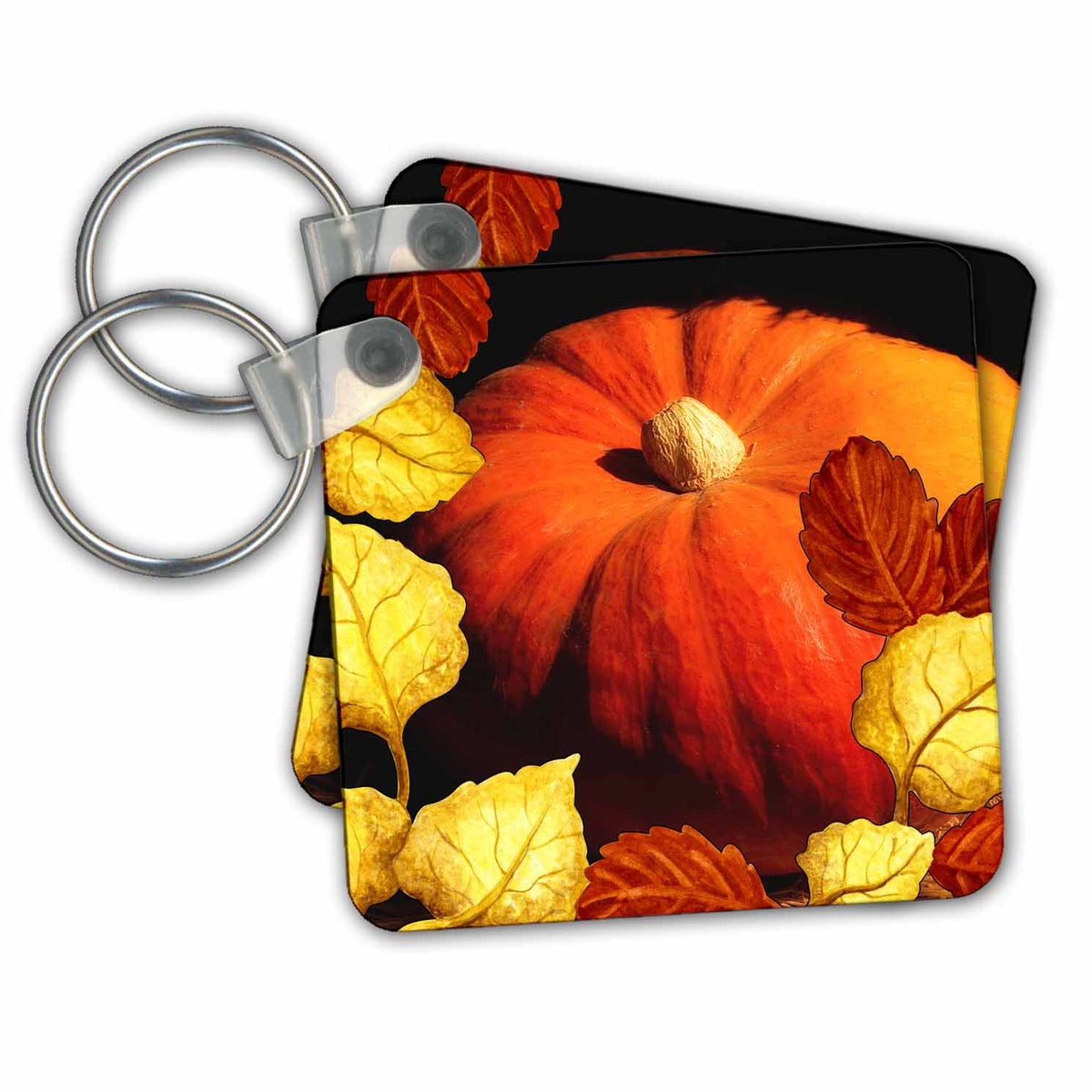 Large pumpkin key chain with autumn leaves design and two metal key rings