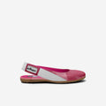 Kids' vegan ballerina flats in pink with white side panels and flat tan sole
