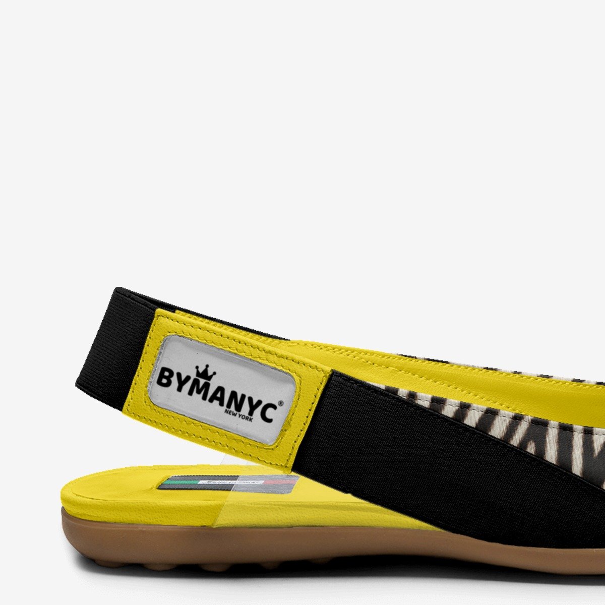 Kids' BYMANYC ballerina flats with logo strap, black and yellow zebra-pattern upper