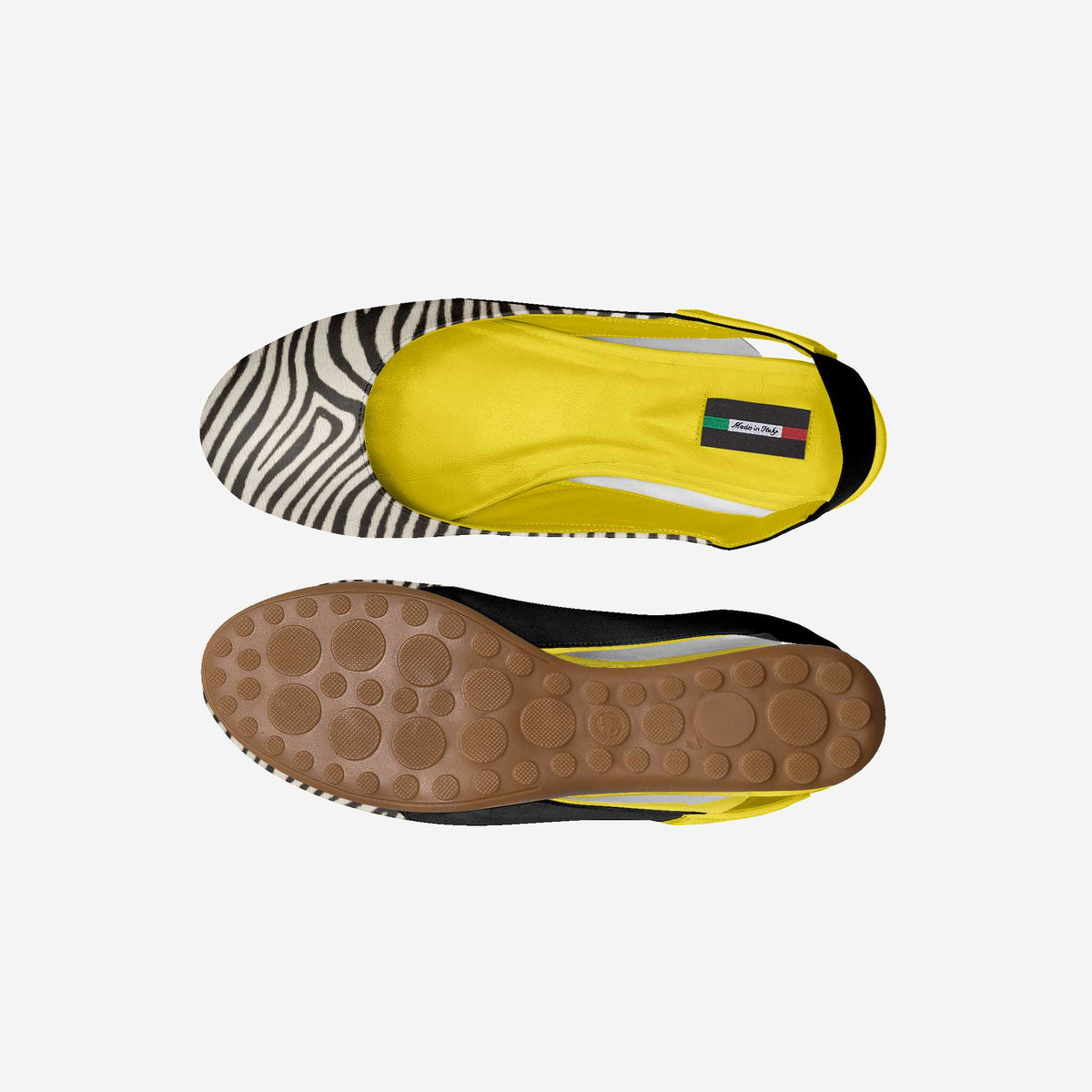 Kids' BYMANYC ballerina flats showing yellow interior and patterned outsole