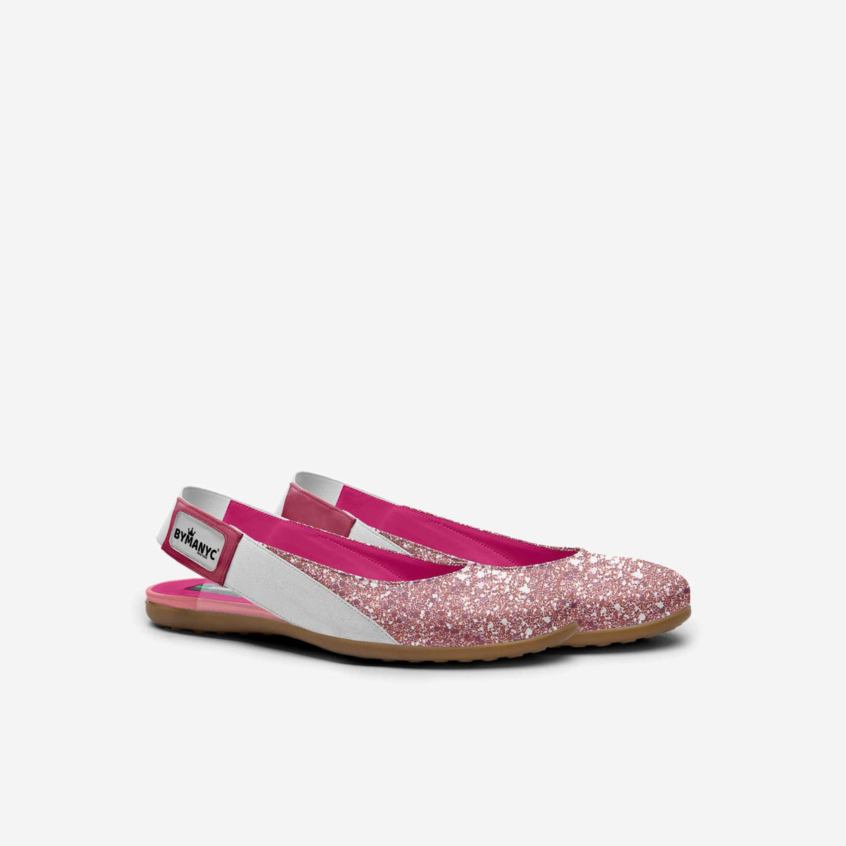 Kids' pink glitter ballerina flats with white elastic strap and tan rubber sole