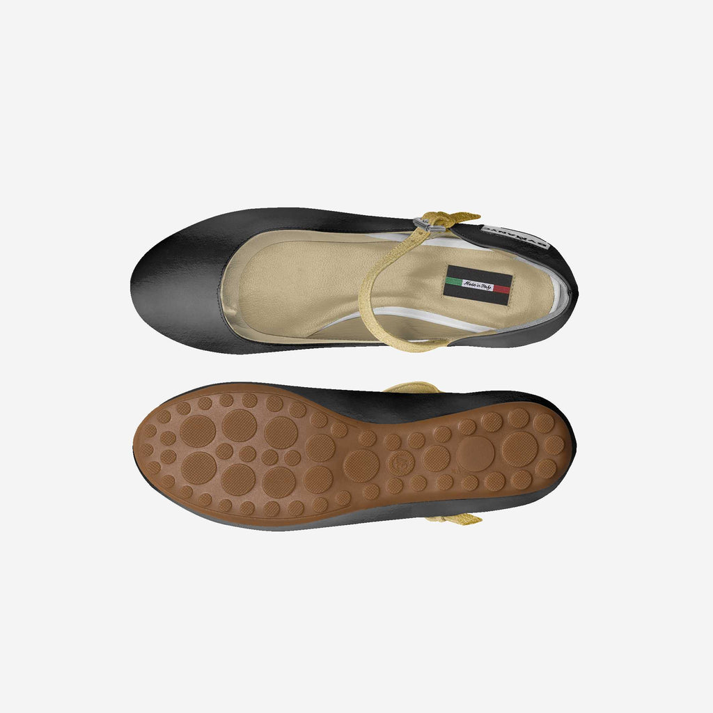 Kids black ballerina flats with gold strap, showing insole and tan rubber outsole