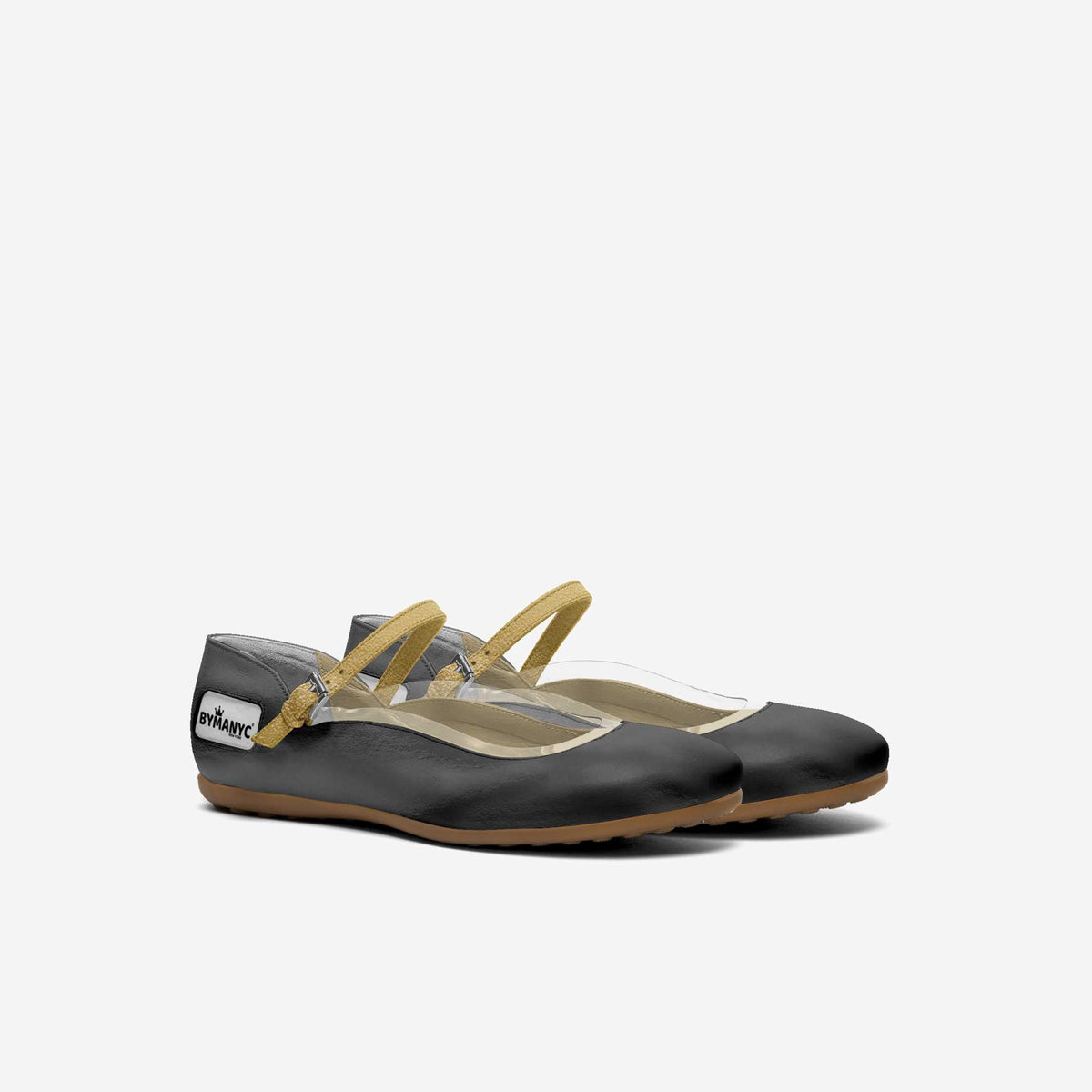 Kids black ballet flats with gold strap detail, tan outsole