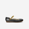 Kids black ballerina flats with gold strap and buckle, tan rubber sole