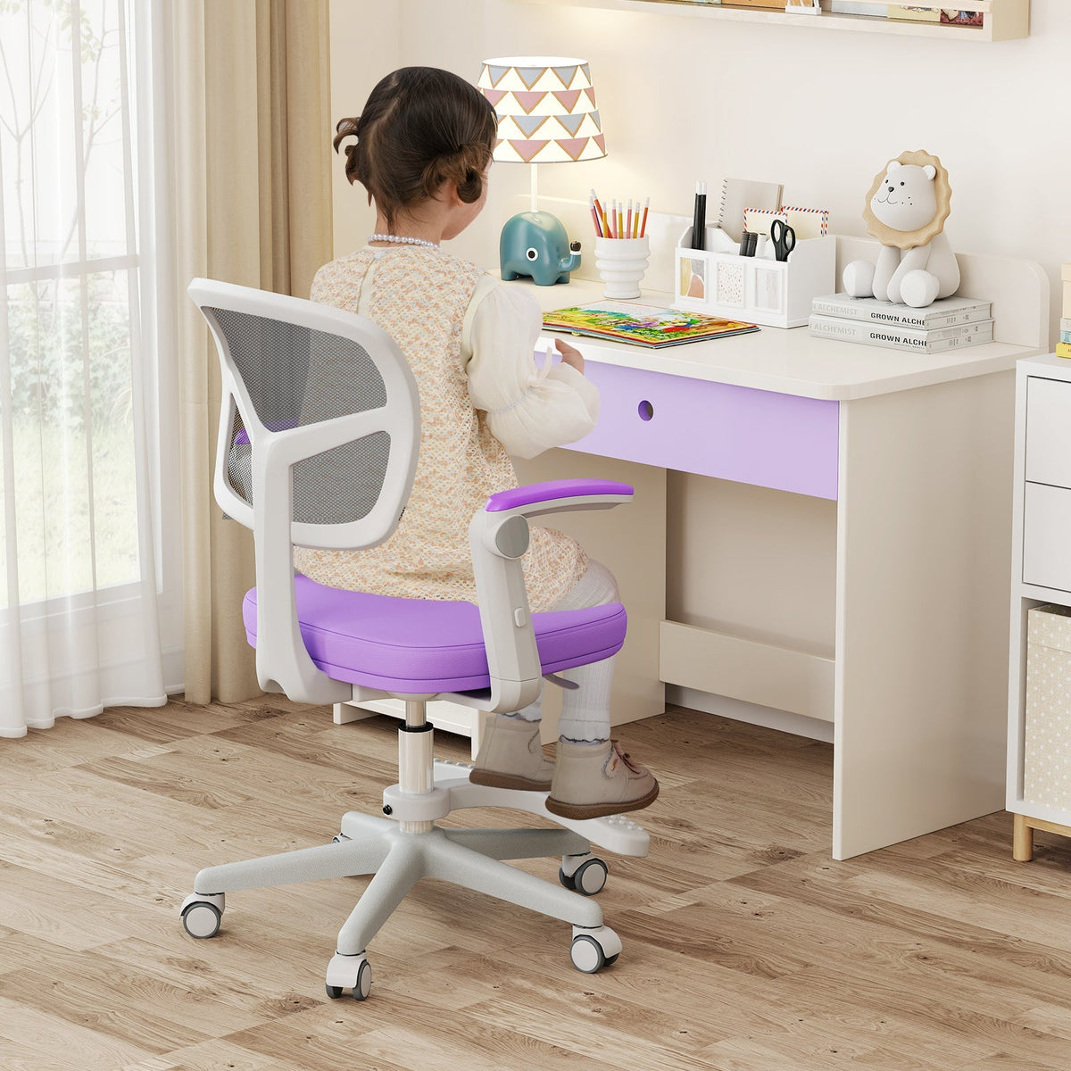 Kids desk chair with adjustable height, armrest, and footrest; purple fabric seat.