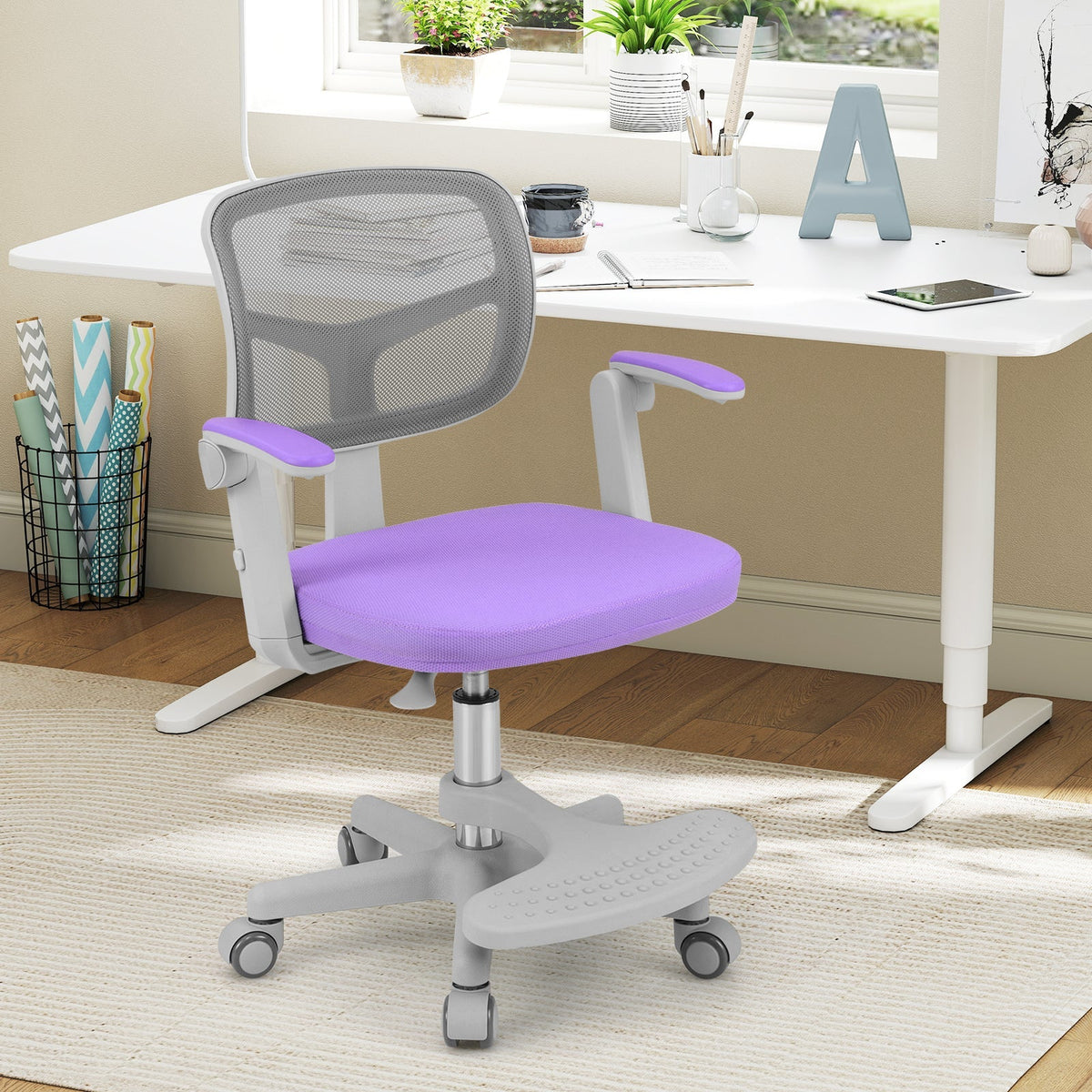 Kids desk chair with purple seat, grey mesh back, adjustable height footrest base