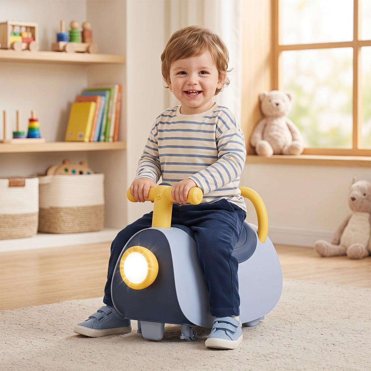 Blue kids push ride-on car with glowing headlight and curved seat, front view