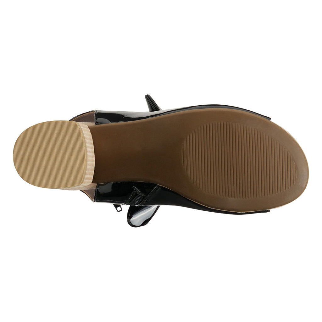 Black heeled sandal outsole with textured grip and peep-toe upper