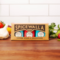Spice tins gift set box with three seasonings: sea salt, crushed red pepper, black pepper