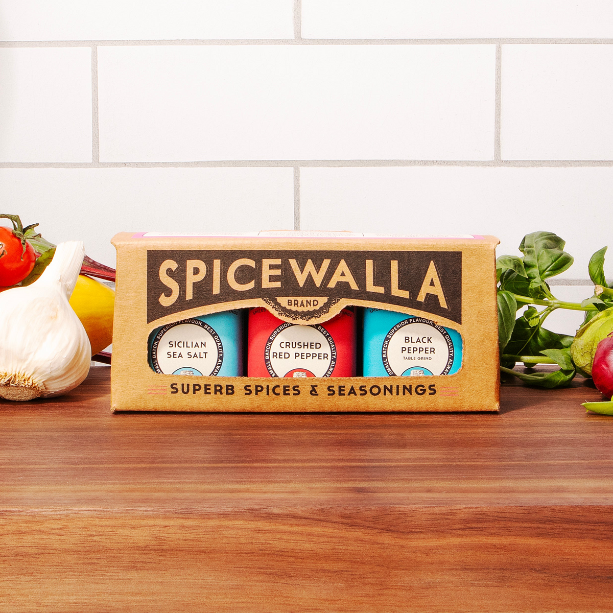 Spice tins gift set box with three seasonings: sea salt, crushed red pepper, black pepper