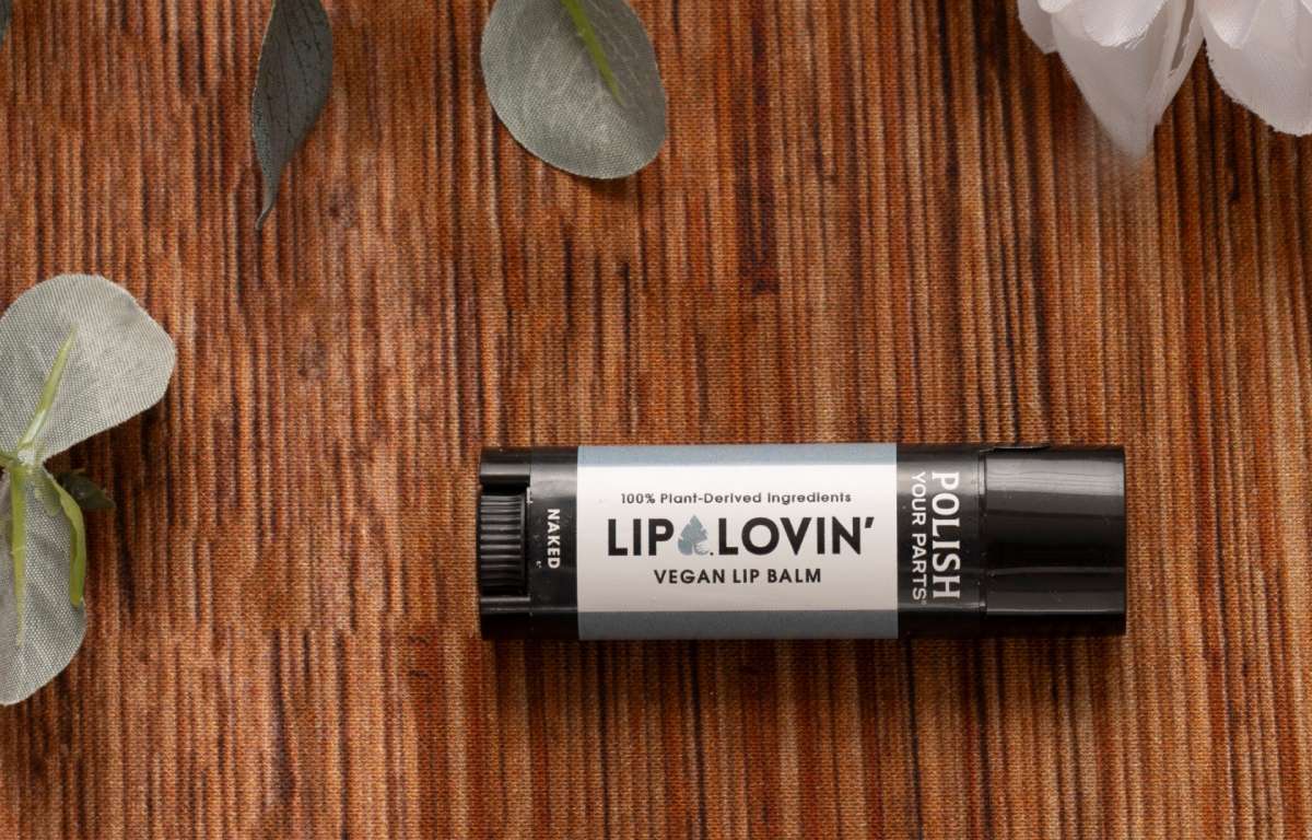 Lip Lovin vegan lip balm in a black-and-white tube