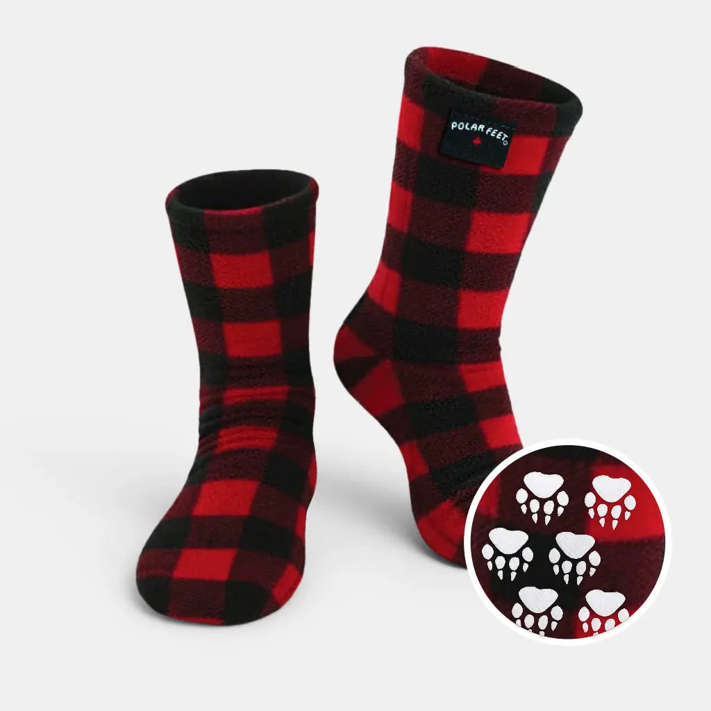 Kids' fleece socks in red-and-black plaid with paw-print nonskid sole badge