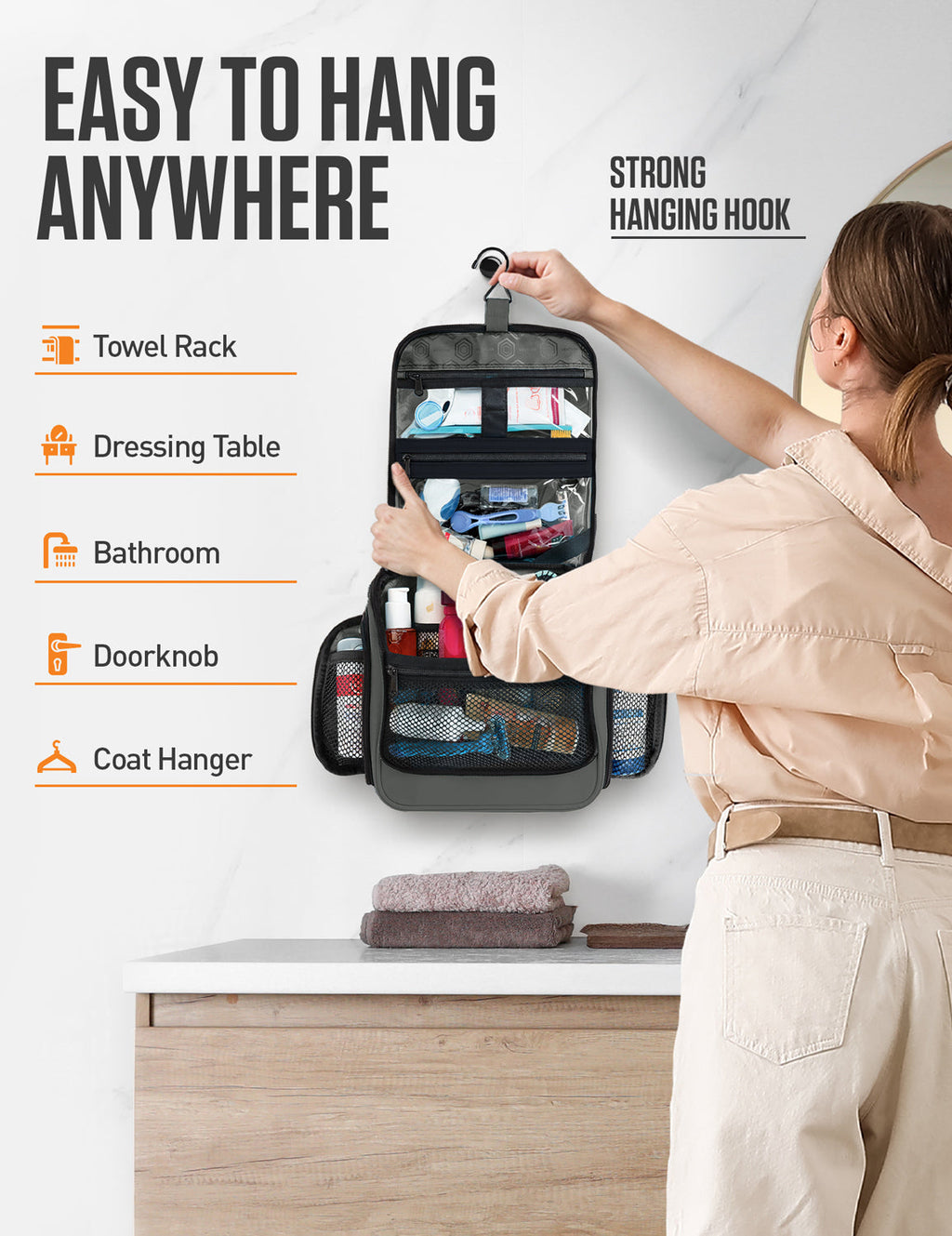 Black hanging toiletry bag that hangs on hook with storage compartments