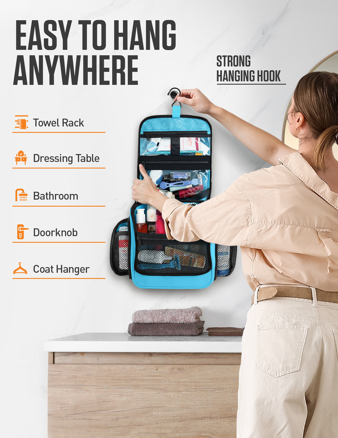 Blue hanging travel toiletry bag on hook with front mesh storage compartments