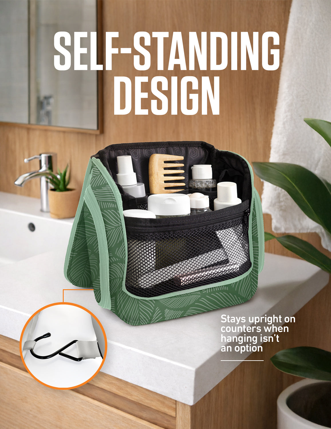 Green leaf-pattern hanging toiletry bag with self-standing design on a countertop.