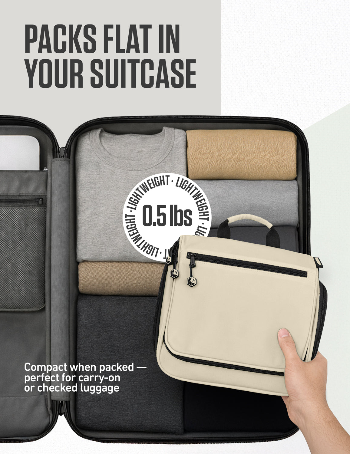 Gray hanging toiletry bag packed flat in a suitcase with small crossbody handle