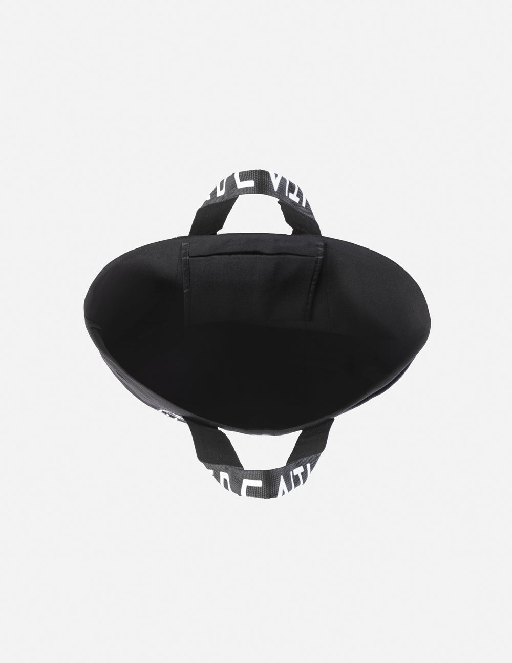 Black tote bag showing curved bottom and strap loops with white 'FAITH' lettering.