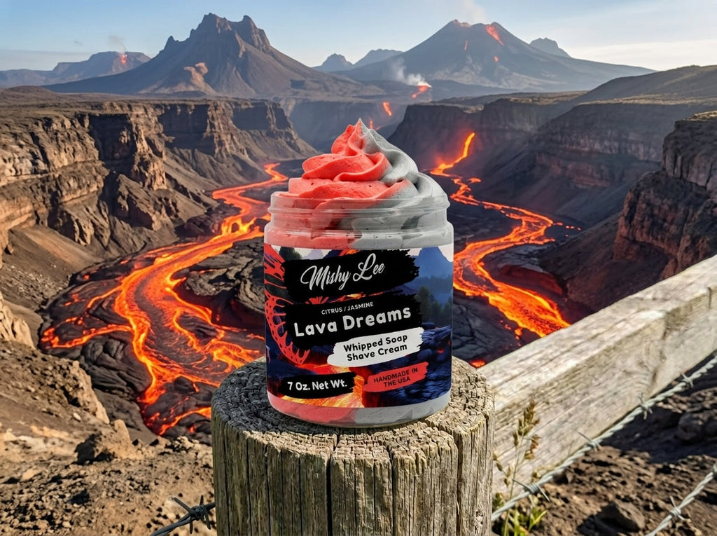 Whipped soap and shave cream jar on a rocky ledge with red and gray swirl top