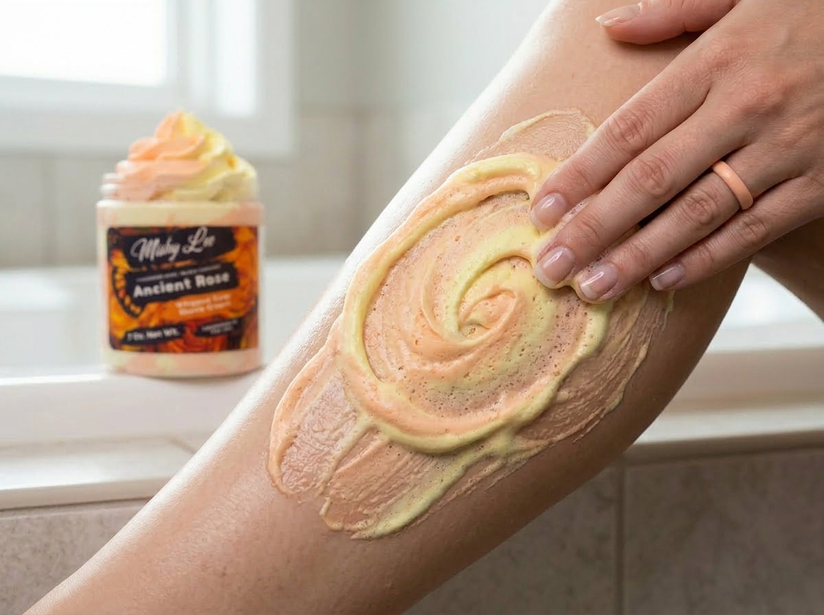 Whipped soap and shave cream spread on arm skin with swirl pattern