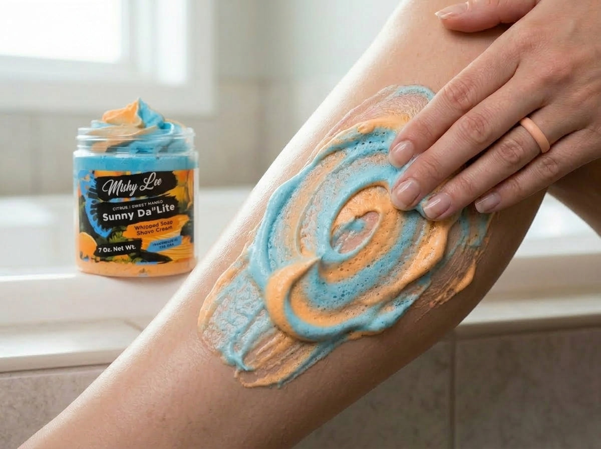 Hand applying peach-and-blue whipped cream to forearm; small jar with swirl top nearby
