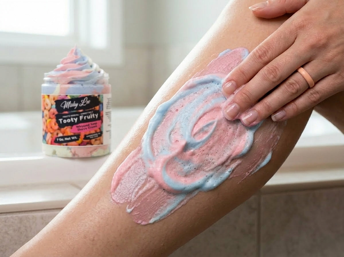 Pastel whipped soap lather on arm with jar in background