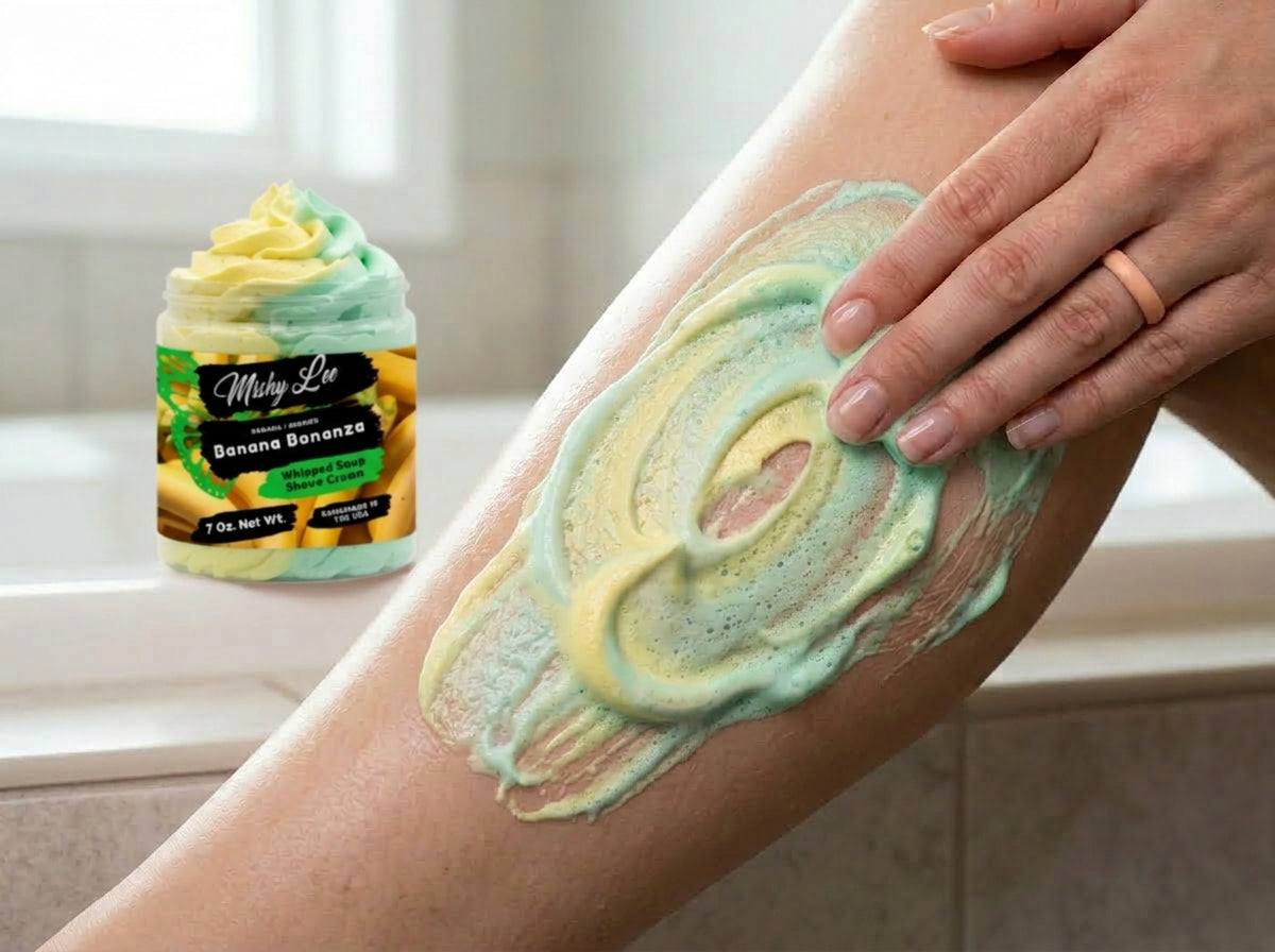 Whipped soap and shave cream lather on skin in yellow and mint swirls