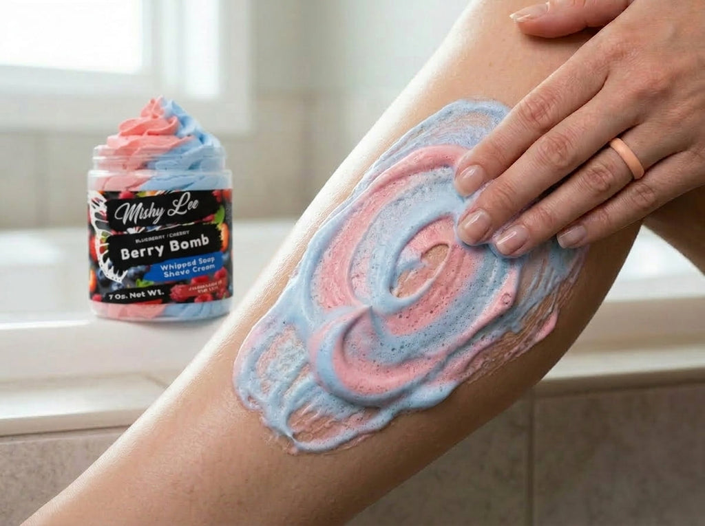 Pink and blue whipped soap and shave cream swirl applied on skin