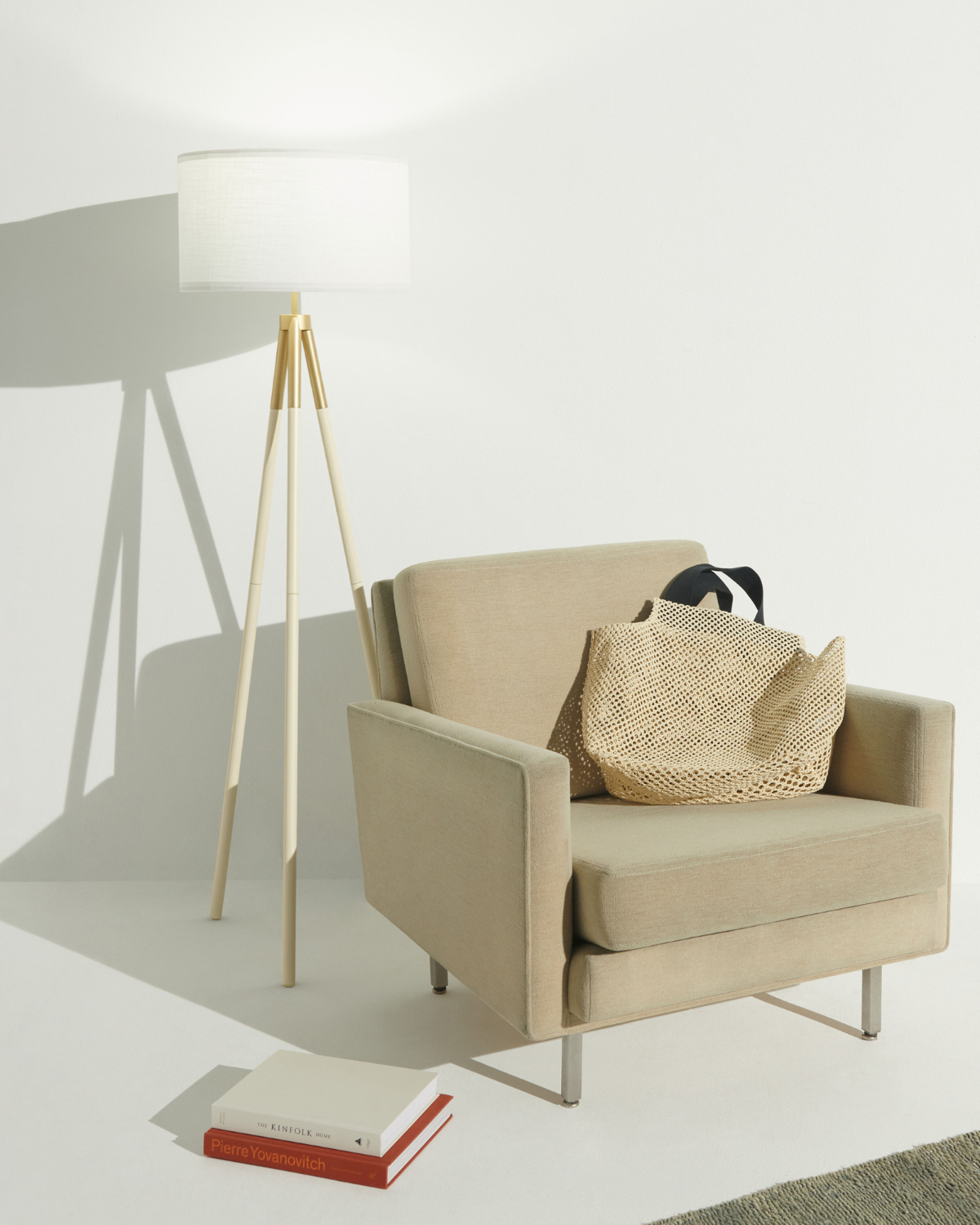 Levi floor lamp with white fabric drum shade and light gold tripod legs
