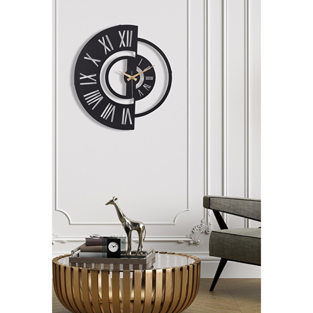 Black modern silent wall clock with Roman numerals and gold-tone hands, large circular design