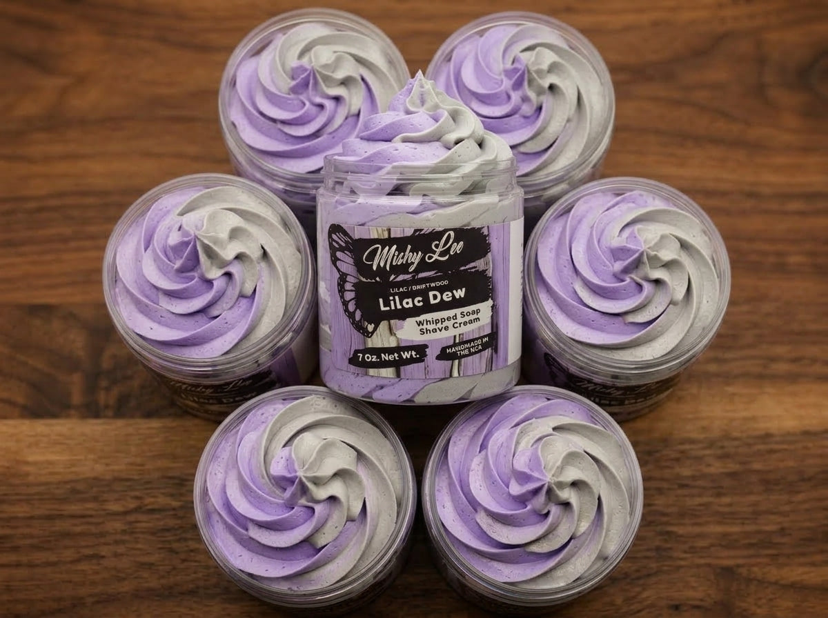Lilac Dew whipped soap and shave cream jar surrounded by small swirled tubs
