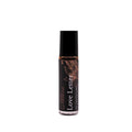 Love Letter botanical perfume rollerball with black cap and amber floral label