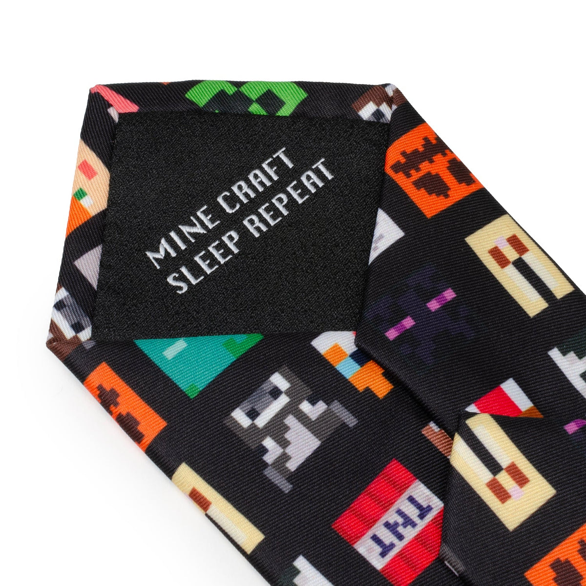 Black men's tie with 'MINE CRAFT SLEEP REPEAT' text panel and pixel icons
