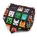 Black men's tie with pixel-game character pattern in multicolor squares and icons