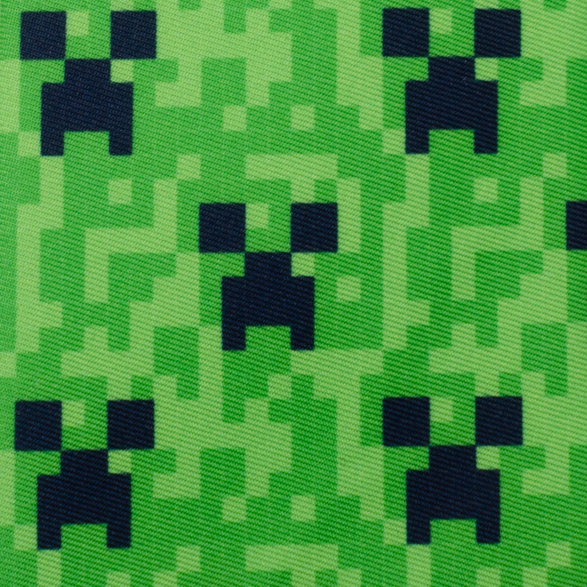 Green pixel pattern fabric with dark creeper squares