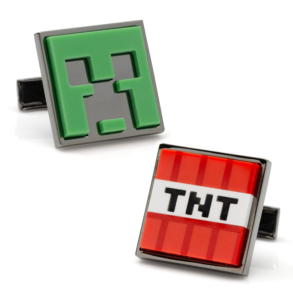 Gunmetal cufflinks showing green Creeper and red TNT designs on black backing