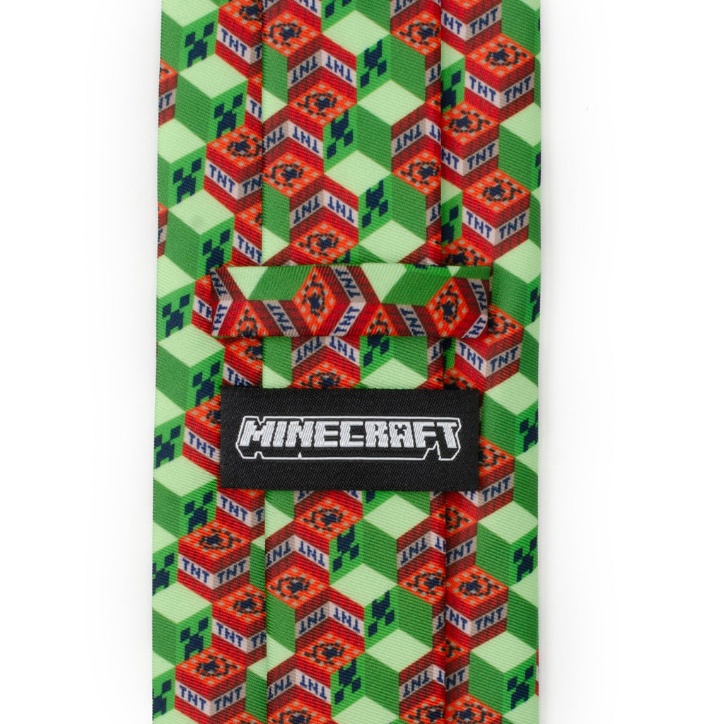 Green novelty necktie with repeating TNT blocks and a Minecraft logo label