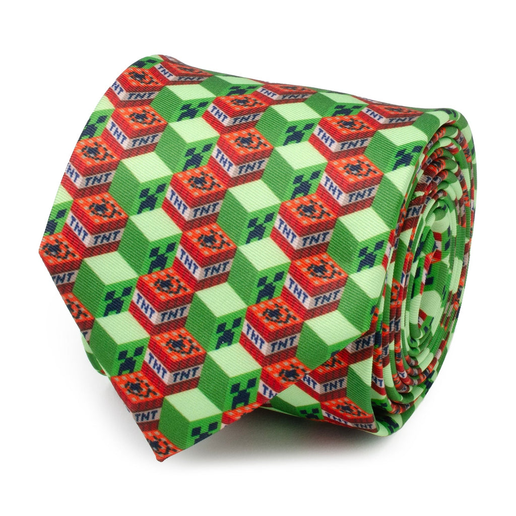 Green patterned necktie with red TNT and cube blocks, folded roll style
