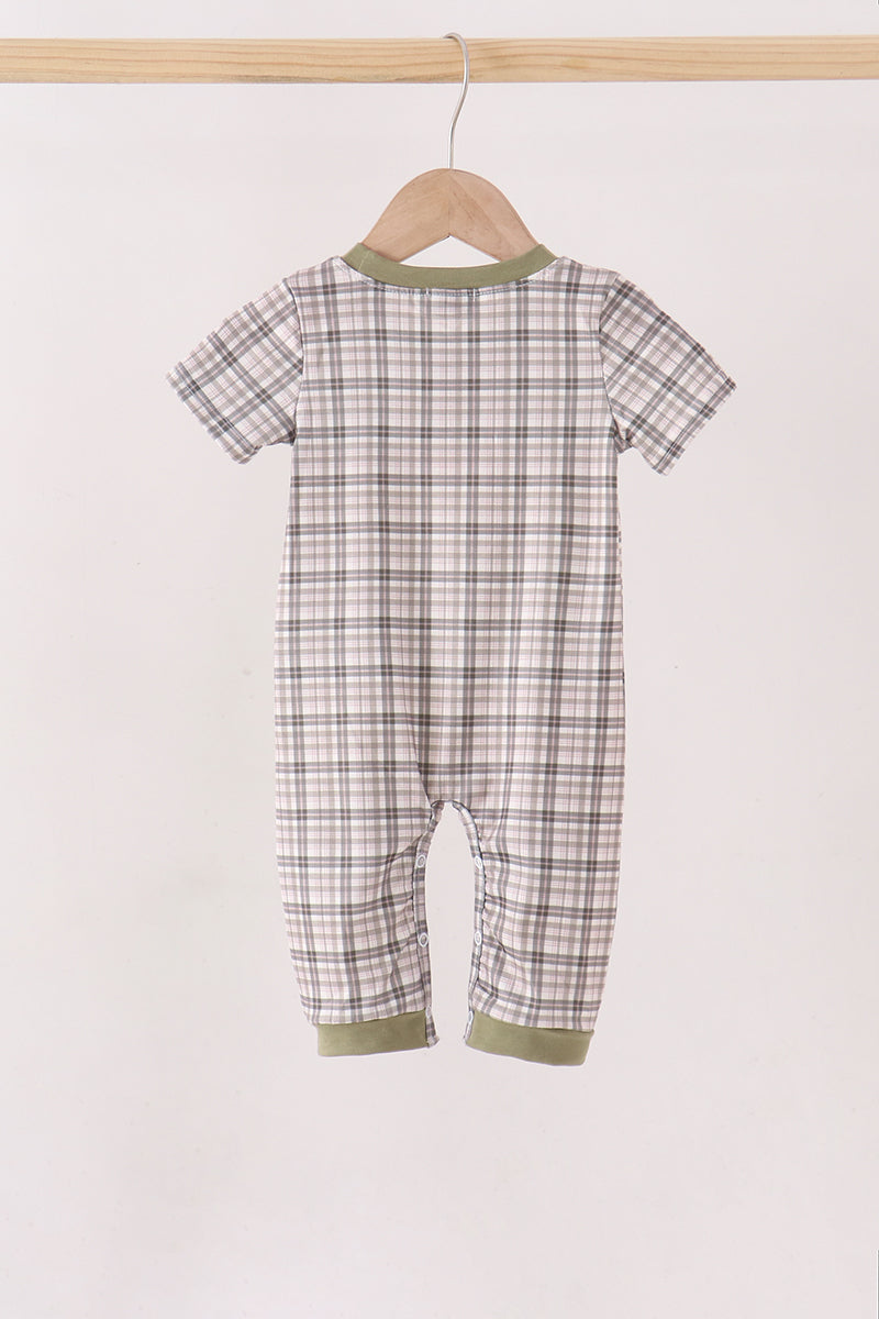 Plaid romper with olive crew neck trim and short sleeves; full front view