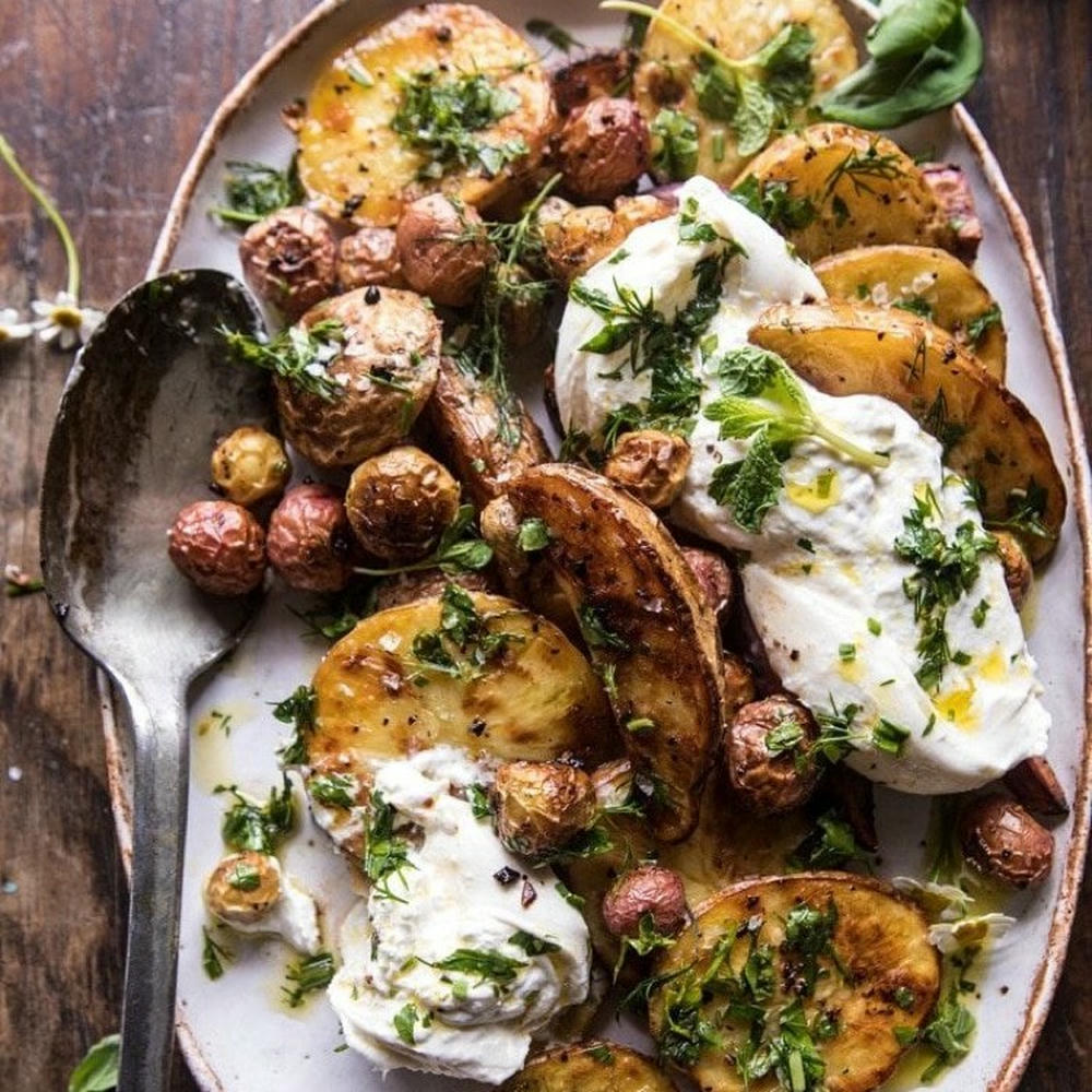 Mediterranean kitchen gift set plated chicken with mushrooms and herb sauce.