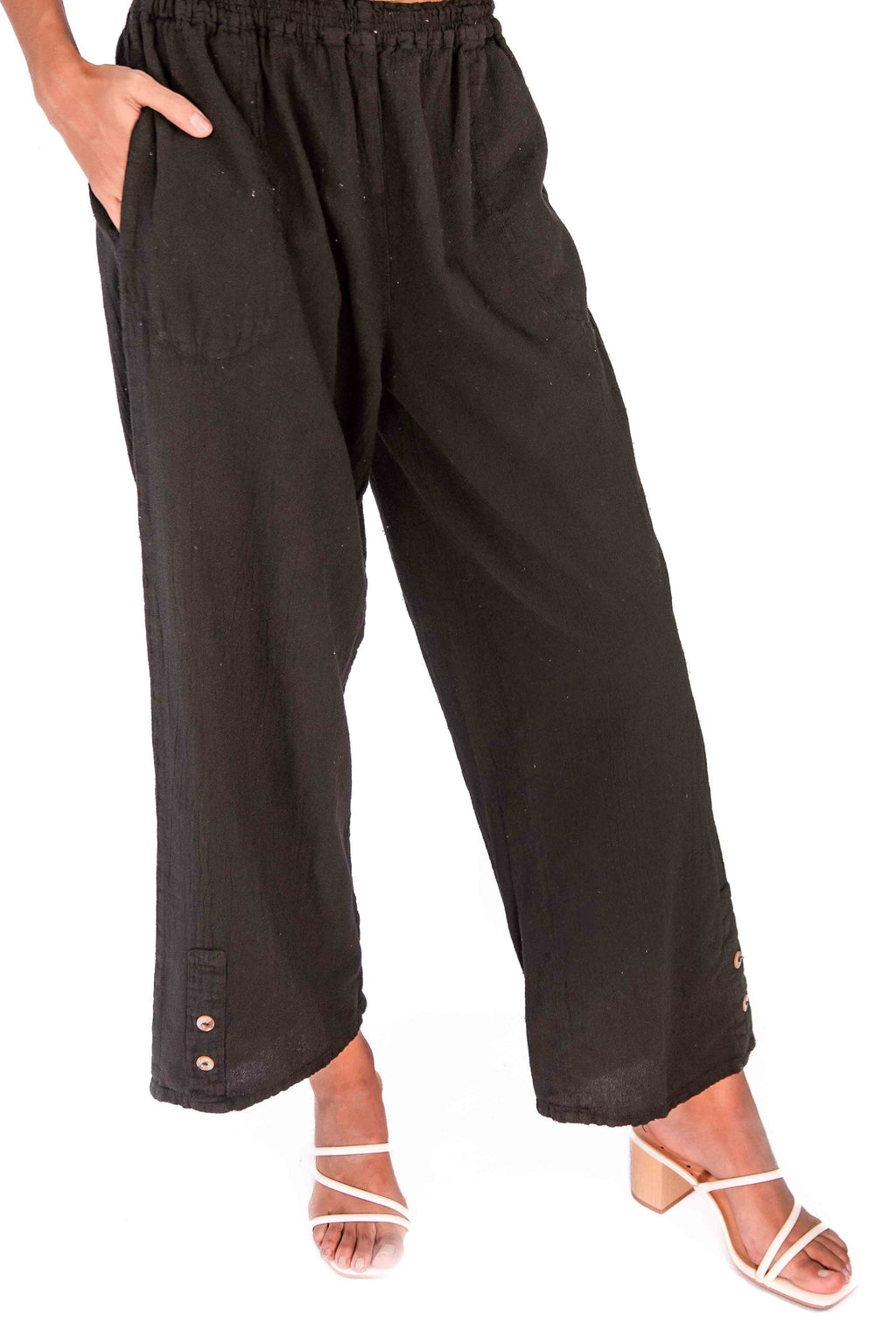 Black cotton gauze pants with elastic waist and wide-leg cropped silhouette