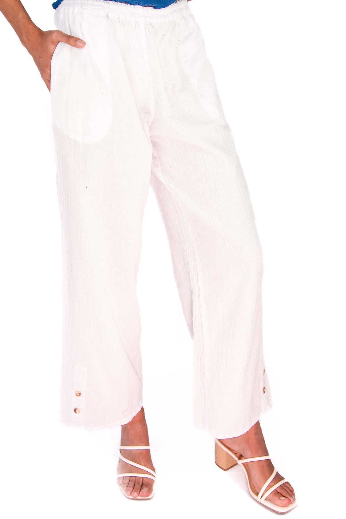 White cotton gauze pants with elastic waist and wide-leg cropped silhouette