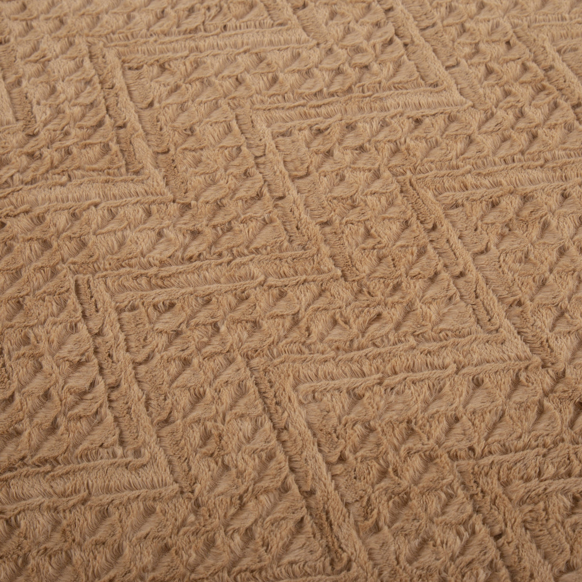 Caramel brown faux fur throw blanket with embossed chevron pattern