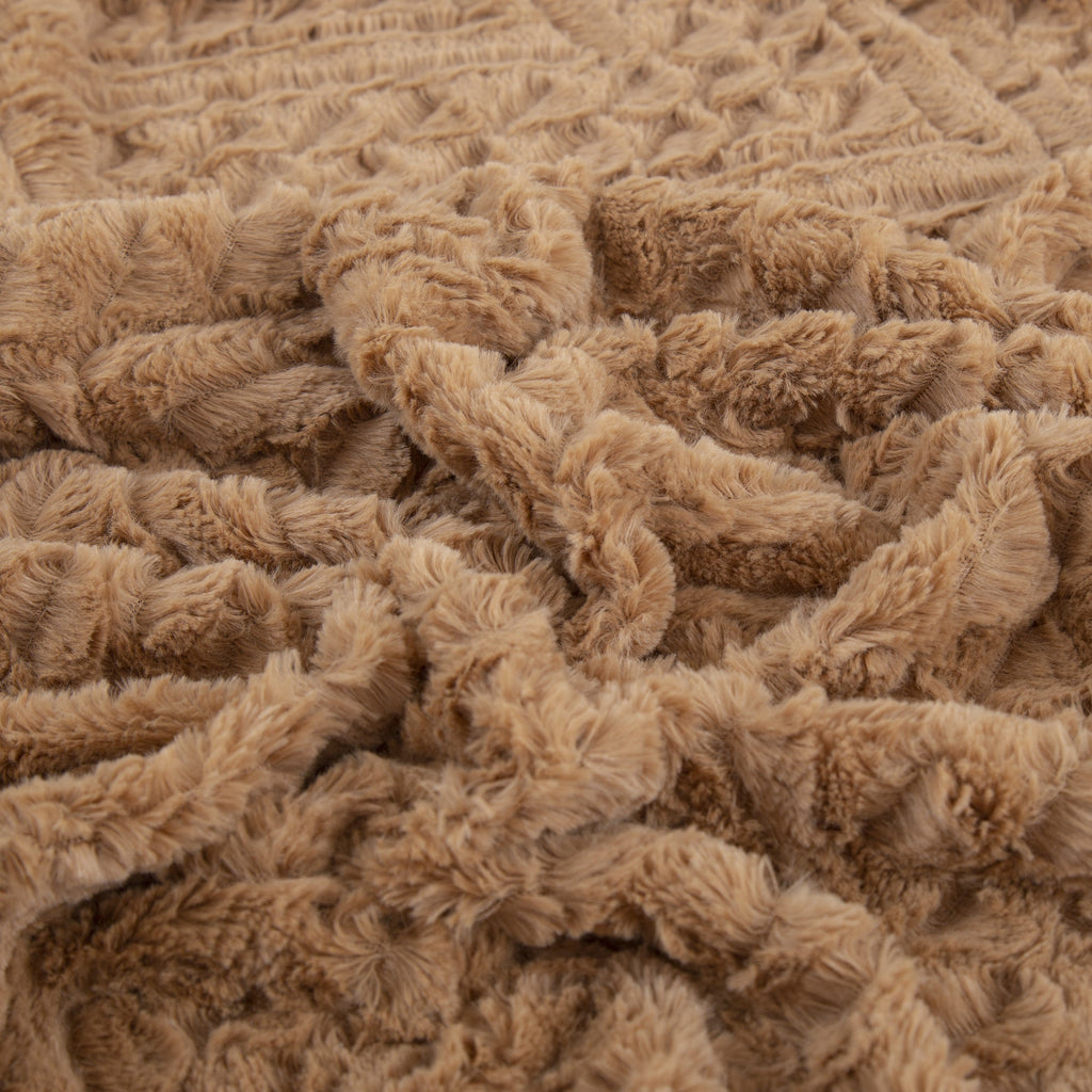 Caramel brown faux fur throw blanket close-up, dense textured loops