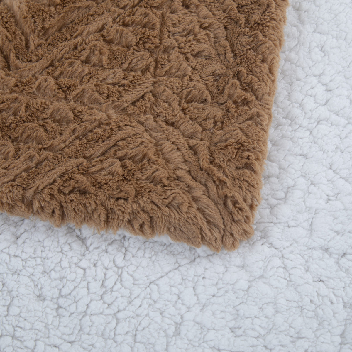 Caramel brown faux fur throw blanket edge with plush nap and solid sherpa reverse