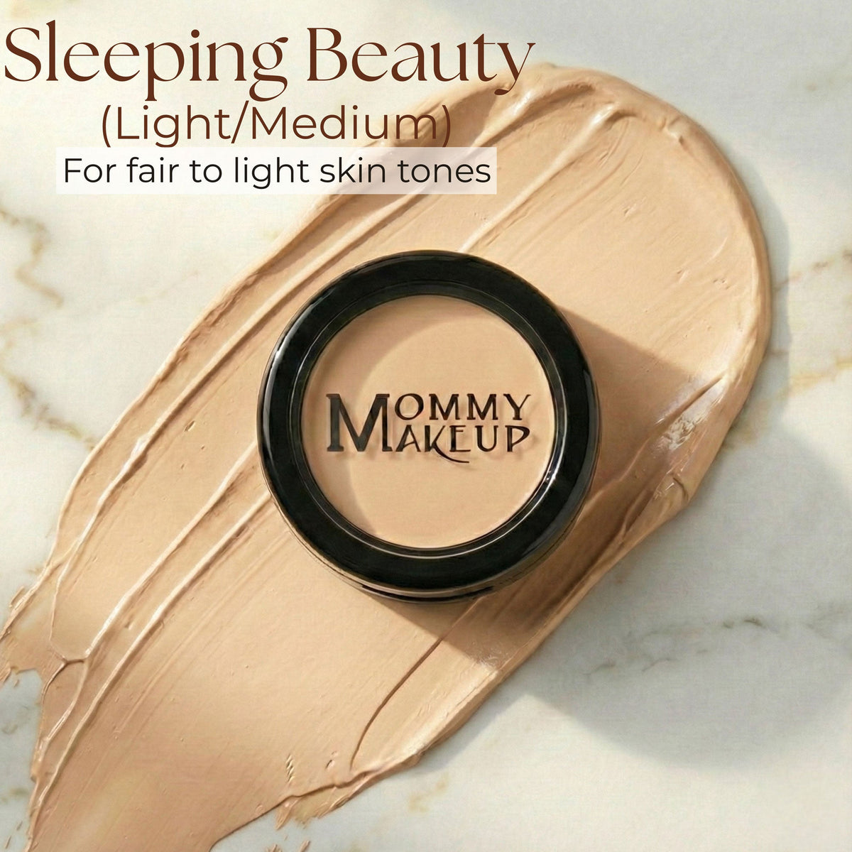 Beige concealer cream swatch with compact in black round case