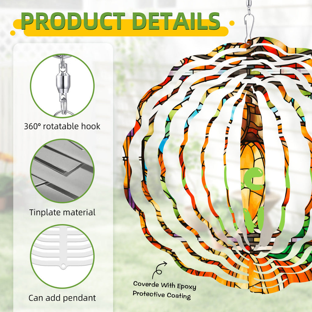 Close-up pumpkin wind spinner with metal hanging loop and stained-glass pattern